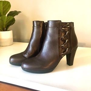 Dark brown heeled boots with side detail